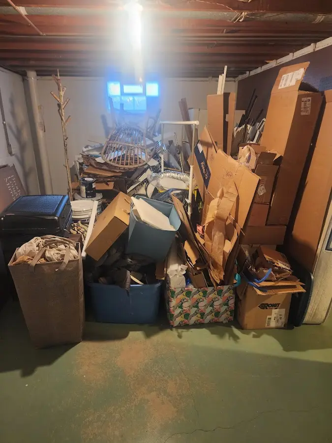 Roll-off dumpster container at job site for 2 Yard Dumpster Rental in Coquille